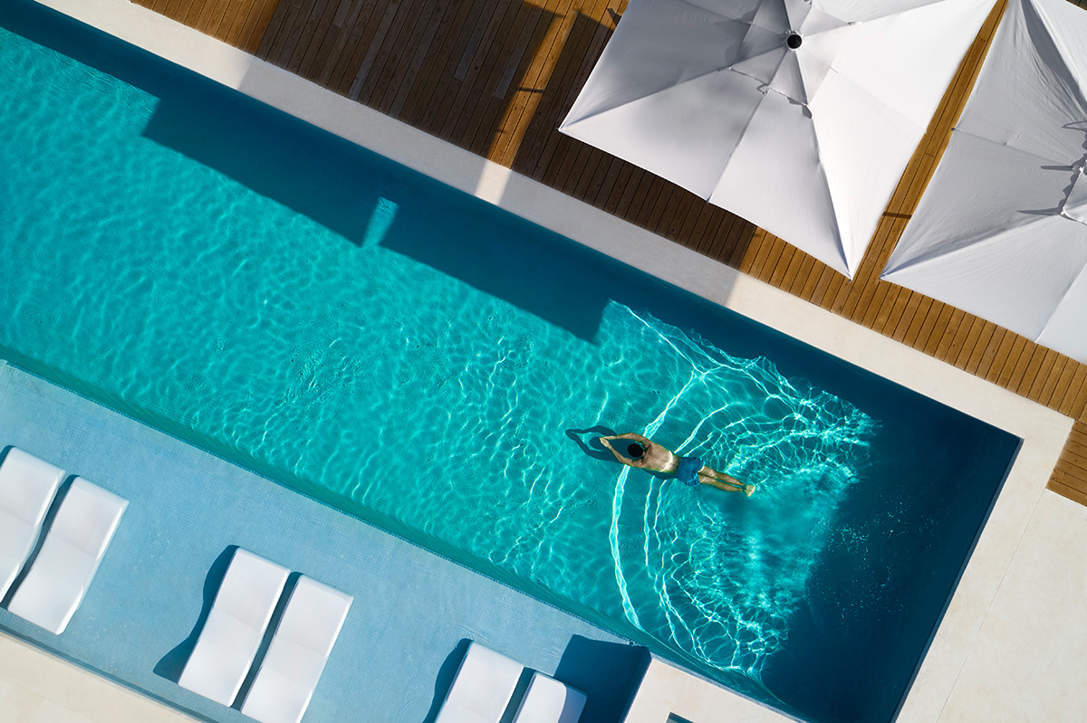 Man swimming at All Inclusive resort