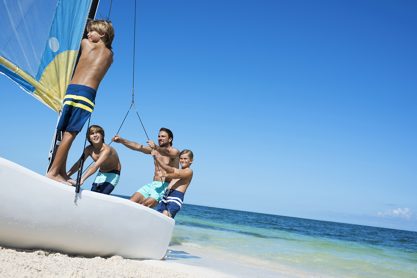 Family fun on the beach of Playa Mujeres in Cancun