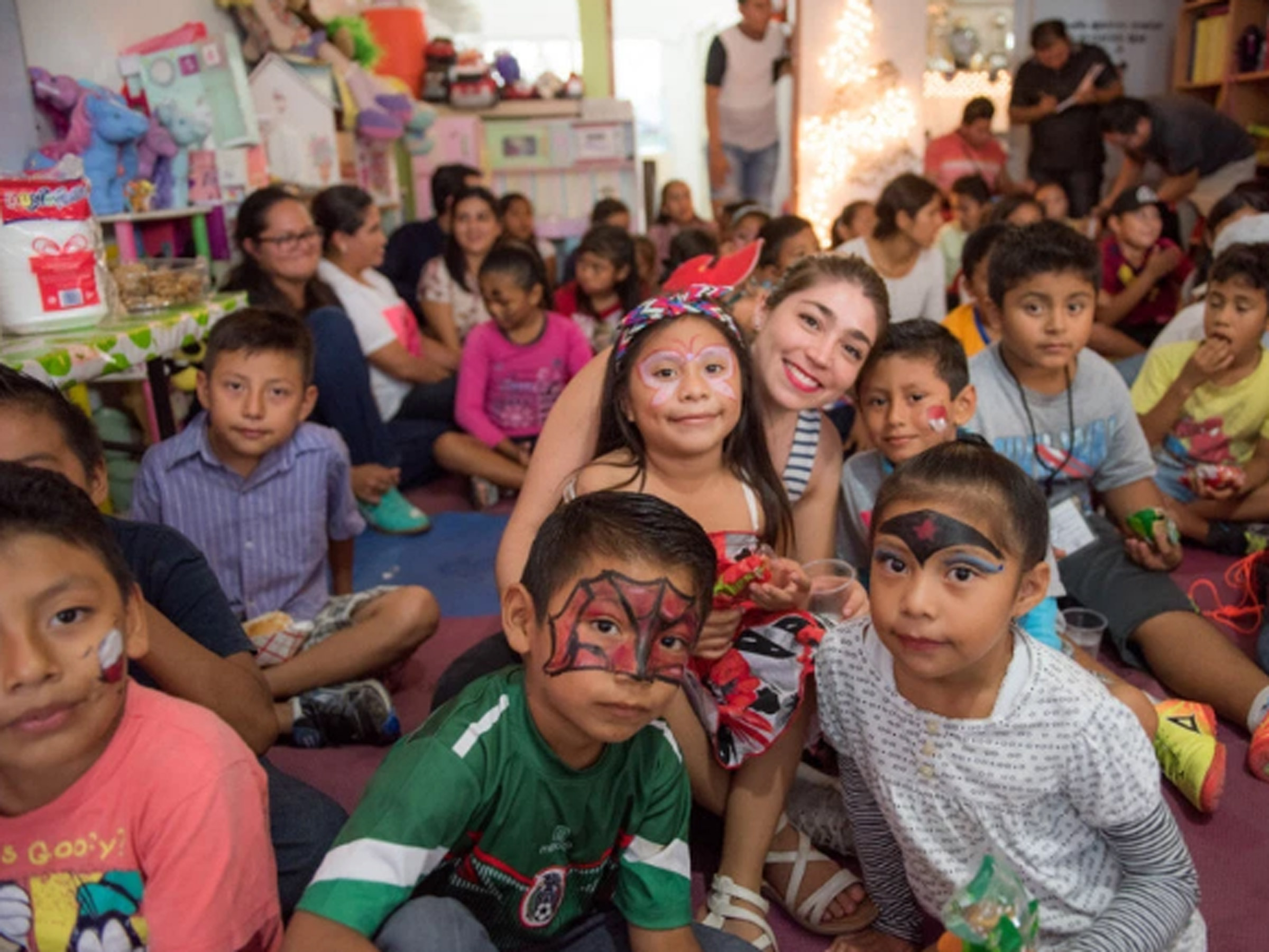 Caribbean children getting together to receive their gifts