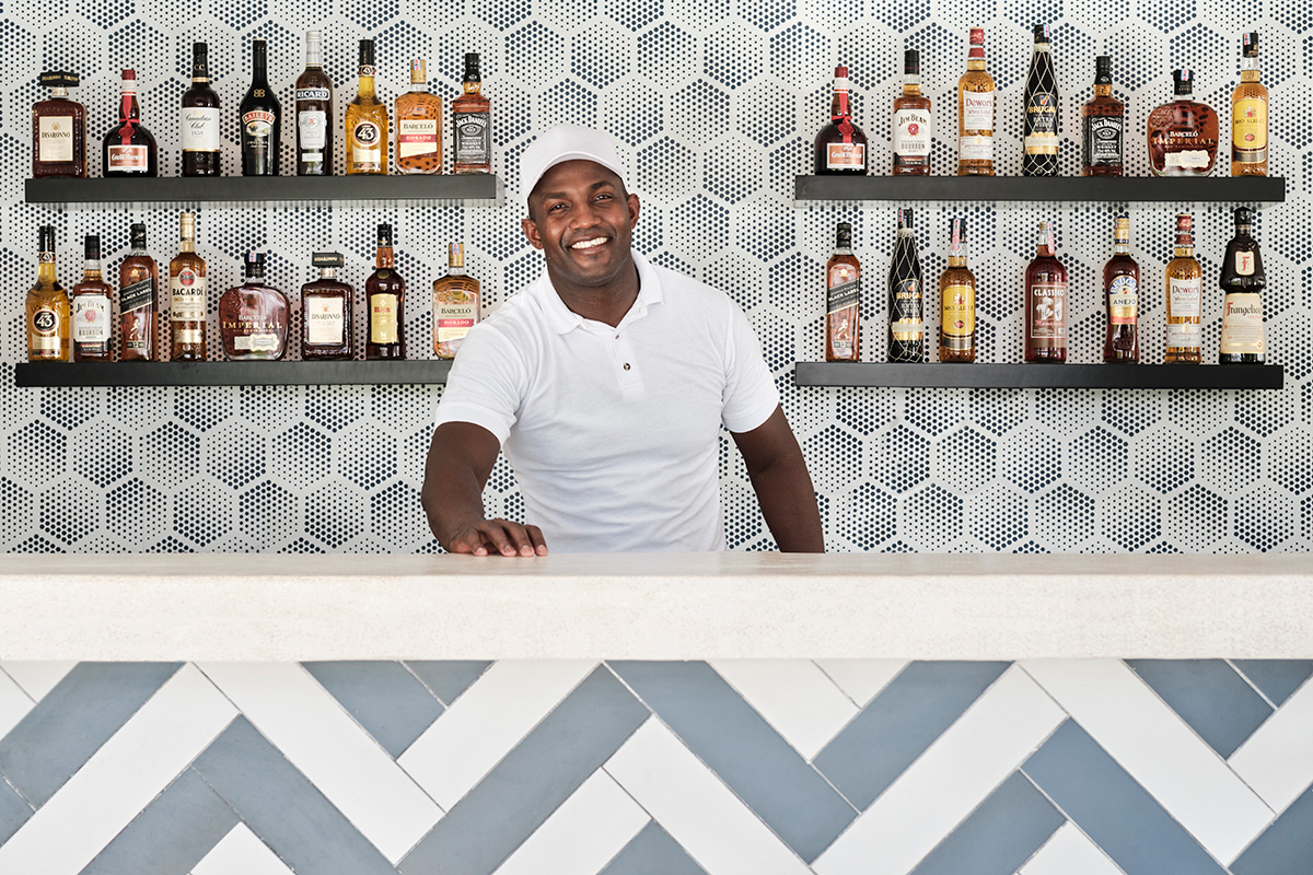 Bartender making rum cocktails in a resort