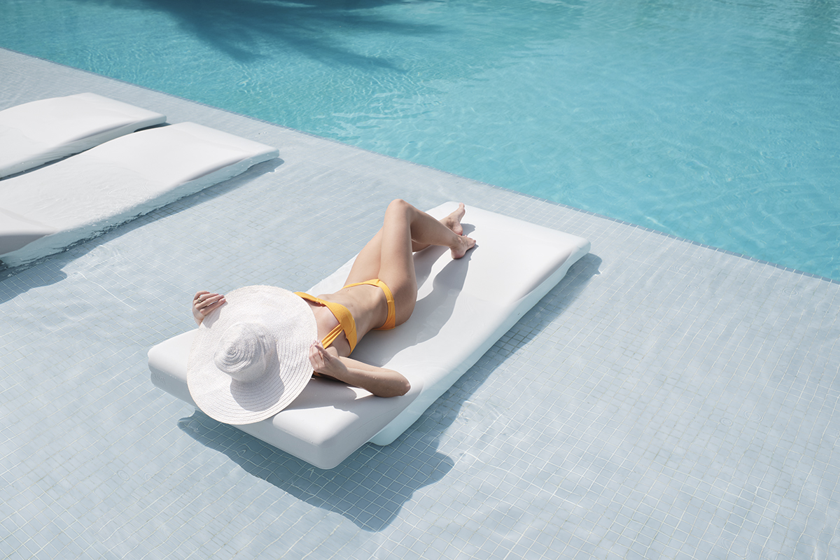 Sunbathing by the pool in Finest Punta Cana