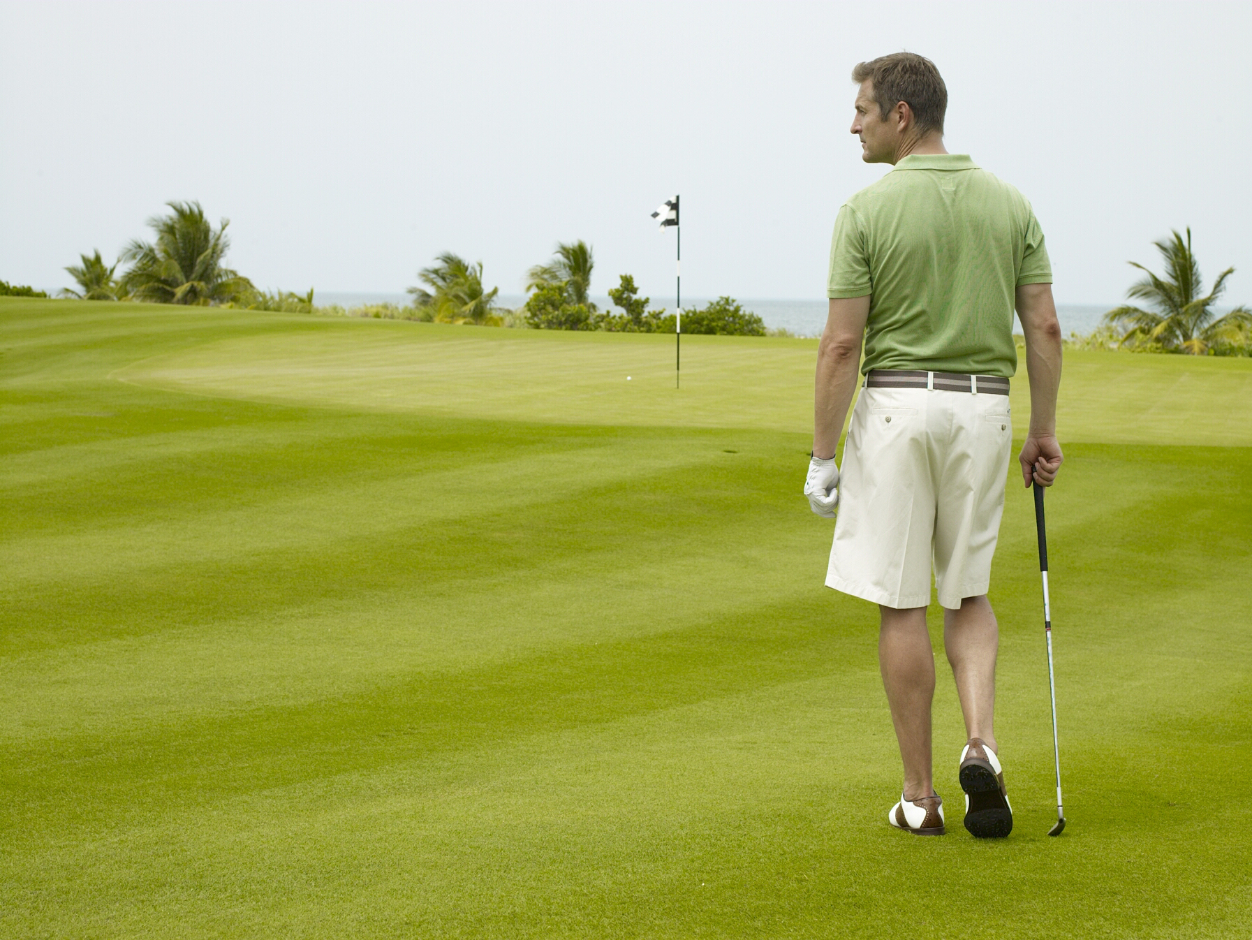 Play golf in Playa Mujeres